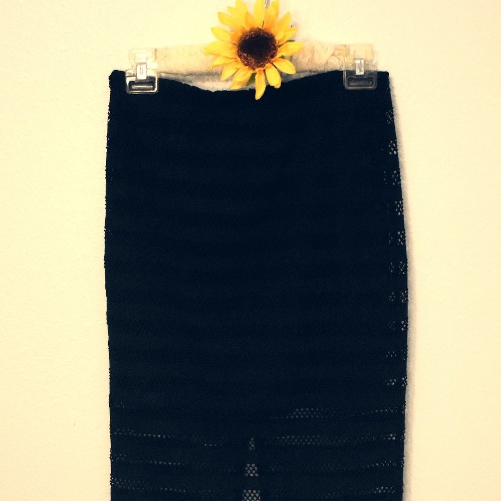 Lacey, patterned pencil skirt with slit detail